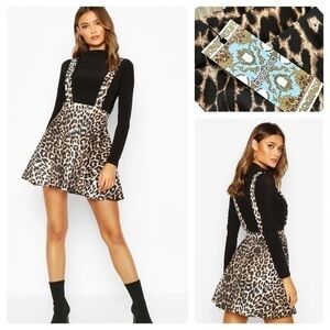 New with tags BOOBOO leopard animal print pinafore skirt. Stretch waistband.